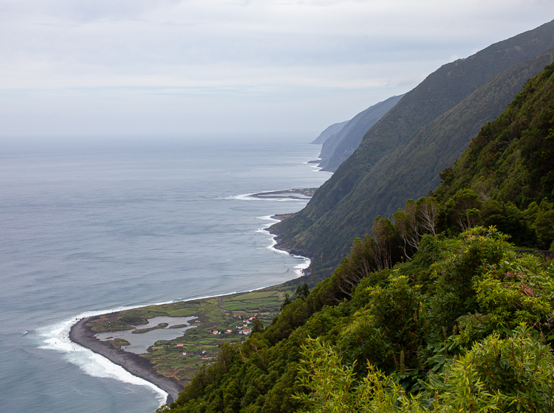 High cliffs, lush greenery, fajas, Sao Jorge, Azores